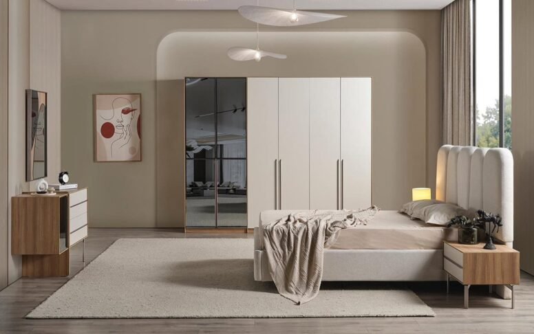 Modern tasarımıyla dikkat çeken yatak odası, doğal ahşap detayları ve zarif dokusuyla estetik bir görünüm sunar. Geniş dolap yapısı ve aynalı kapakları sayesinde hem şıklık hem de fonksiyonellik sağlar. Sağlam iskeleti ve kaliteli malzemesiyle uzun yıllar güvenle kullanılabilir.