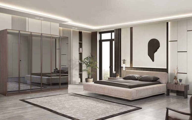 Modern yatak odası takımı, estetik tasarımı ve kullanışlı detaylarıyla yaşam alanlarınıza şıklık katıyor. Takım içeriğinde 1 adet geniş dolap, 1 adet başlıklı karyola ve 2 adet komodin bulunmaktadır. 160x200 ölçülerindeki karyola sağlam yapısı ve konforlu tasarımıyla uzun yıllar güvenle kullanılabilir. Dolap bölmeleri askılıklı, raflı ve çekmeceli şekilde tasarlanmış olup, kıyafetlerinizi ve kişisel eşyalarınızı düzenli bir biçimde saklamanıza yardımcı olur. ISO 9001 Avrupa kalite standartlarına uygun iskelet malzemesi, dayanıklılığıyla öne çıkar. Modelde baza fonksiyonu bulunmaz, fonksiyonel karyola yapısı tercih edilmiştir. Ürün bakımı oldukça kolaydır; aşırı sıcakla temastan kaçınılmalı ve kimyasal içermeyen temizleyiciler kullanılmalıdır. Tüm ürünler demonte şekilde paketlenerek güvenli kargo ile gönderilir. Teslimat süresi 25-35 iş günü olup, Türkiye’nin her şehrine ve tüm Avrupa ülkelerine ulaştırılabilmektedir. Şık, kaliteli ve modern yatak odası takımıyla evinizde tarzı ve konforu bir arada yaşayın.