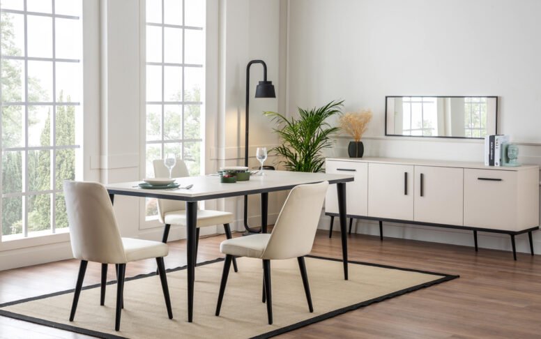 Bu modern yemek odası takımı, sade tasarımıyla evinizde ferahlık ve zarafet yaratır. Açık renk tonlarıyla tasarlanan masa ve sandalyeler, doğal ahşap detaylarla